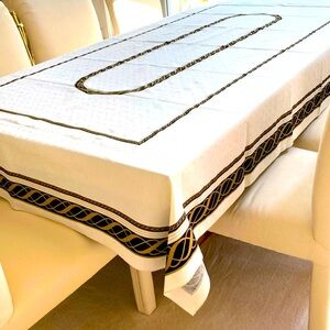 Elegant Lenox Ivory, Black and Gold Tablecloth 
63 inX 82 in.